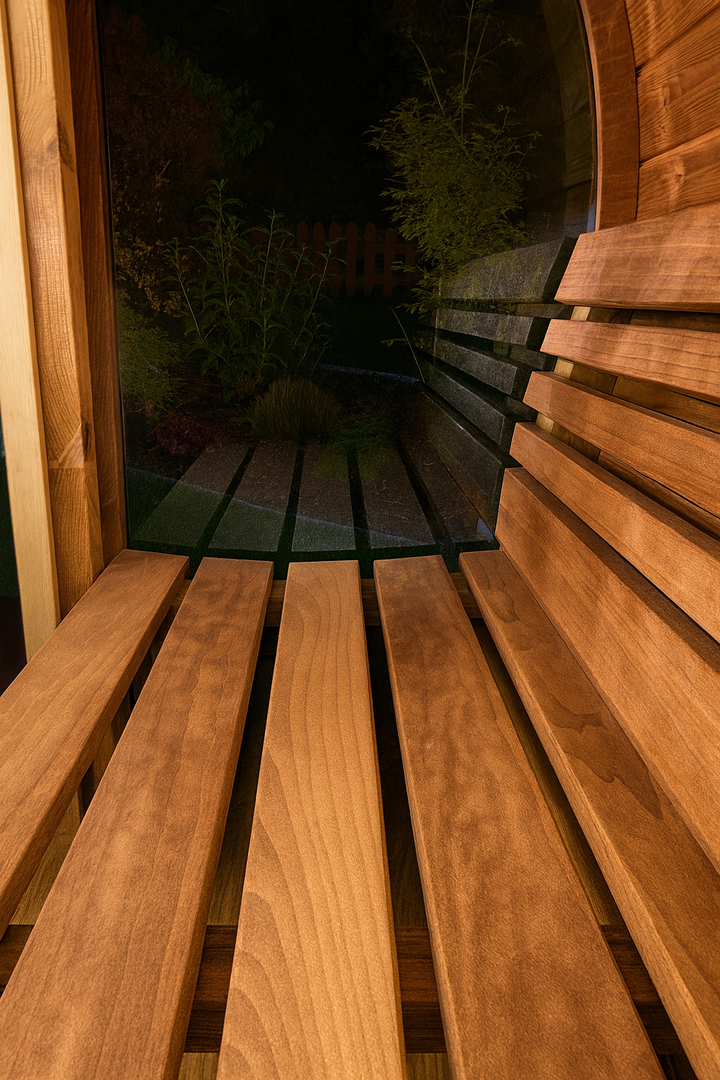 Interior wooden bench seating of SaunaLife E7G ERGO Series barrel sauna with ergonomic design