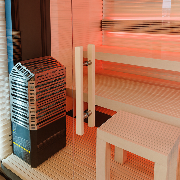 Saunum AIR 5 electric sauna heater in a modern sauna with wooden benches
