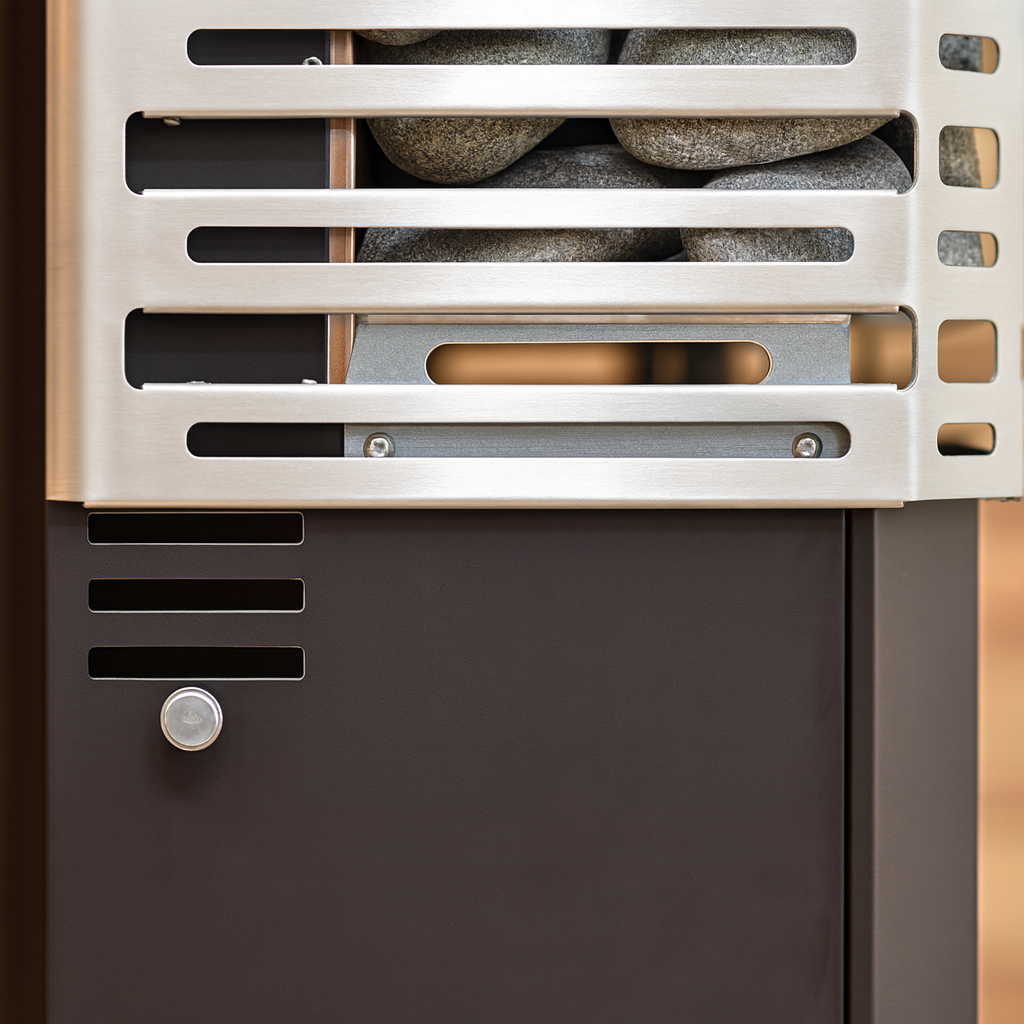 Saunum AIR 5 electric sauna heater with stainless steel design and smooth stones for optimal heating