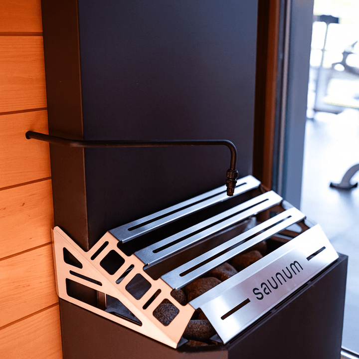 Saunum AIR 7 sauna heater kit with sleek design and stone holder for optimal sauna experience