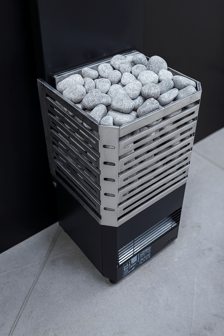 Saunum AIR L-13 electric sauna heater with decorative stones for an efficient sauna experience