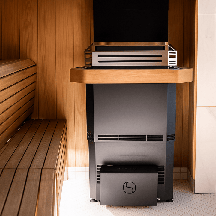 Saunum AIR L-13 sauna heater kit installed in a modern sauna interior with wooden benches