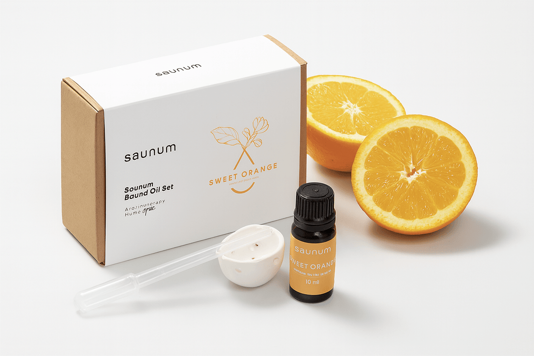 Saunum sweet orange aroma oil set with essential oil bottle and fresh oranges for aromatherapy