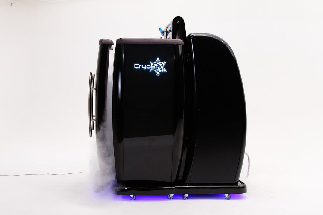 Vacuactivus cryotherapy chamber with sleek black design and fog for cooling effects