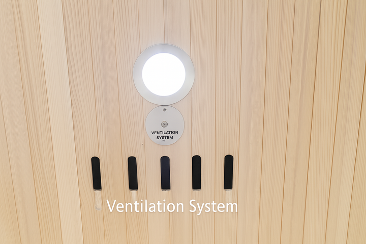 Ventilation system controls inside SunRay 2-person infrared sauna with wooden paneling