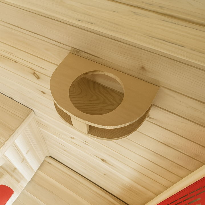Interior close-up of SunRay 2-person infrared sauna showing wooden air vent and smooth light wood paneling