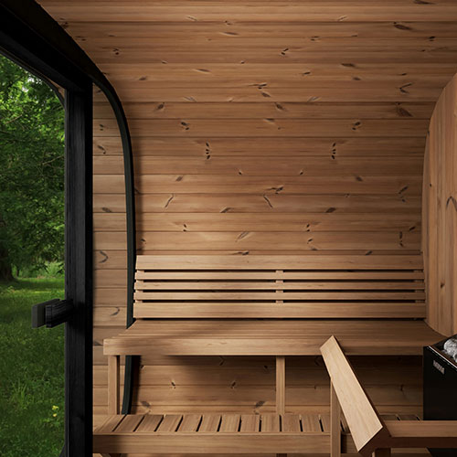 Interior view of SaunaLife Cube-Series sauna for sale with wooden benches and natural light