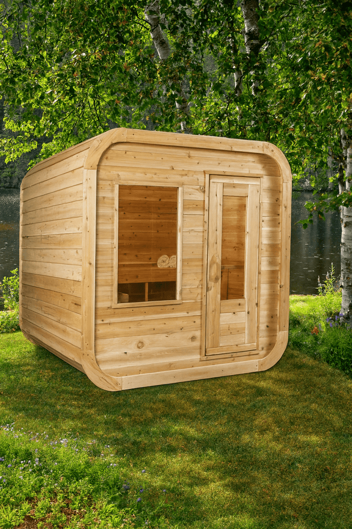 Leisurecraft outdoor luxury sauna made of natural wood, featuring large windows and a modern design in a scenic setting