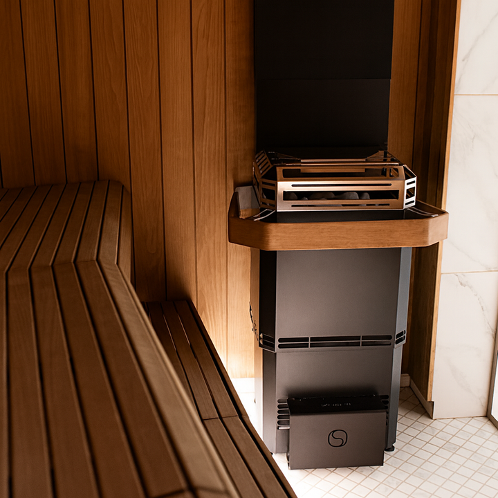 Saunum WiFi sauna heater package installed in a wooden sauna for optimal heating and relaxation