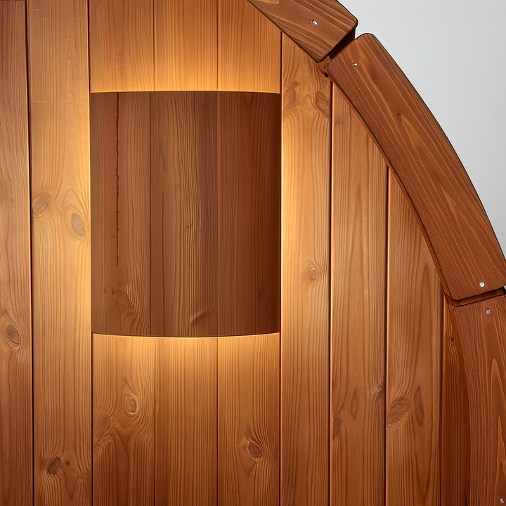 SaunaLife accessory featuring LED lighting for barrel saunas with warm wood paneling design