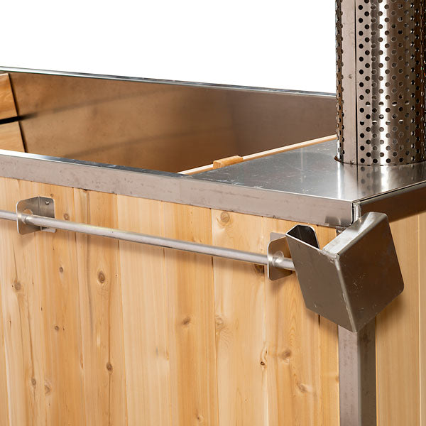 Leisurecraft wood burning hot tub with natural wooden panels and stainless steel stove