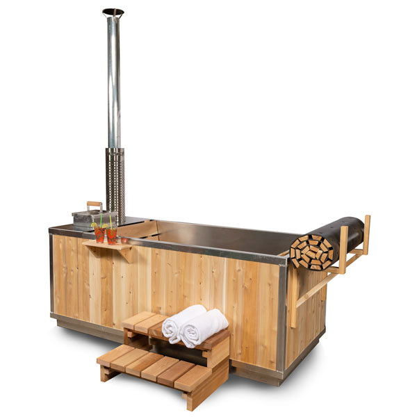 Leisurecraft wood burning hot tub with wooden exterior, chimney, towel rack, and steps