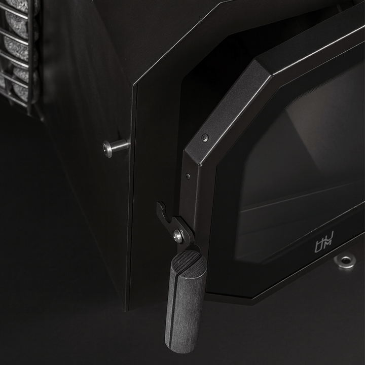 HUUM wood burning sauna stove with a glass door and sleek design for efficient heating